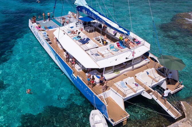 Blue Lagoon, Beaches and Bays Catamaran Sailing Tour - Ghajn Tuffieha, Mellieha, and Ramla Bay