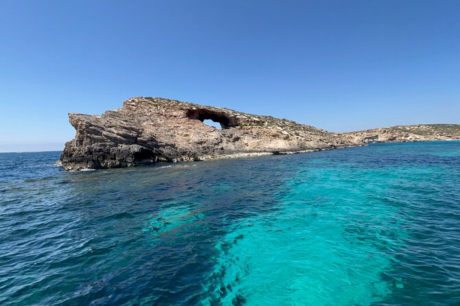 Blue Lagoon Ferry and Caves Tour - Crystal Lagoon Bay on the way back