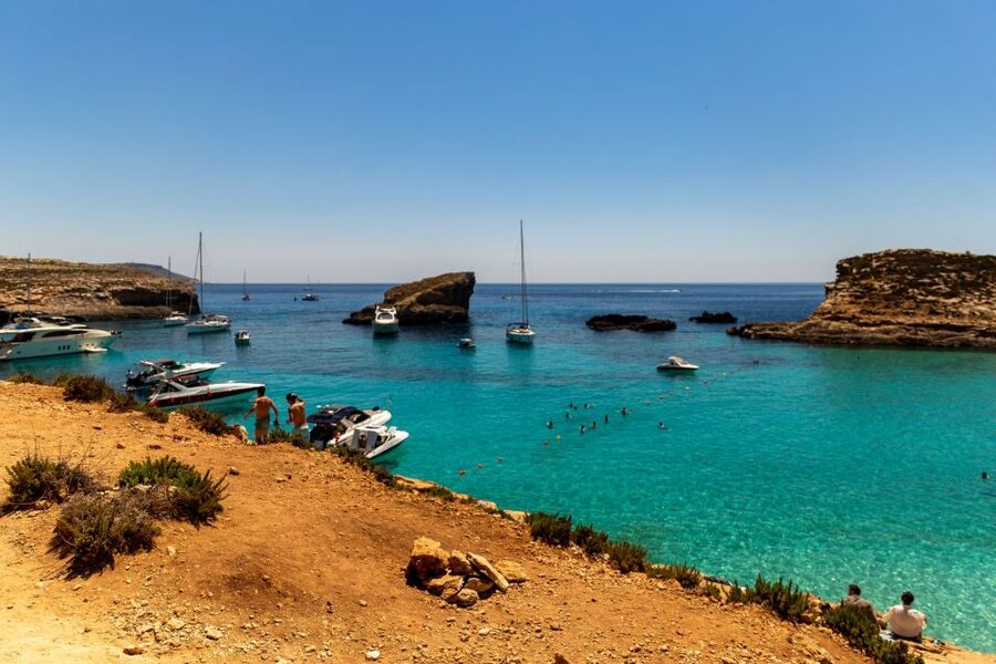 Bugibba: Scenic Sunset Cruise with Blue Lagoon Swim Stop - The north coast with reggae on the speakers