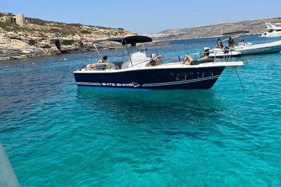 Cirkewwa/Mgarr: Blue and Crystal Lagoon Private Boat Charter - Leaving the harbor on a 22-foot boat
