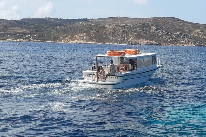 Comino and Gozo Private Boat Tour : Julie Pearl Boat - Crystal Lagoon and Comino’s cave country