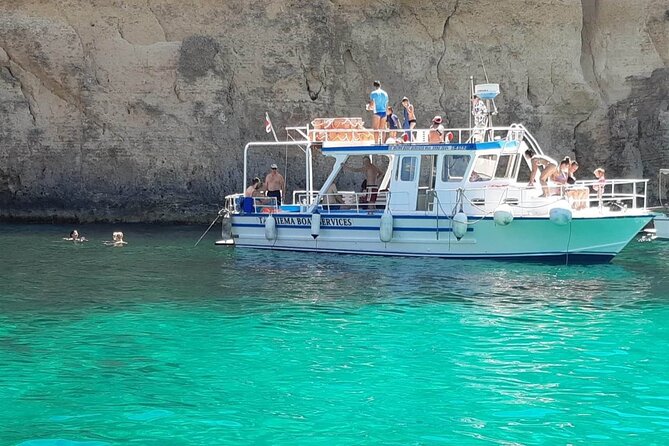 Comino Blue Lagoon and Gozo Private Boat Charter: Lucky Lady Boat - Crystal Lagoon brings caves and calmer exploration