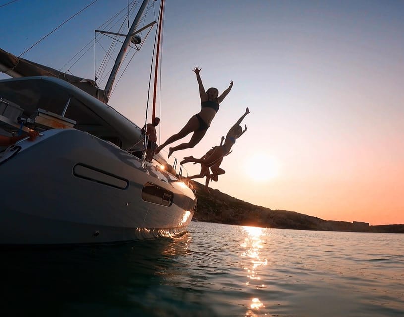 Evening Catamaran Charter - Sunset, city lights, and photographs