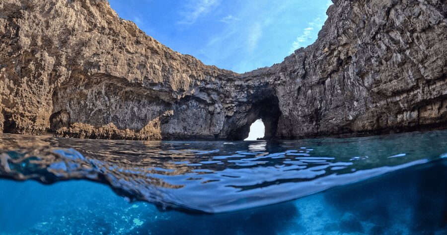 From Mellieħa: Coral Lagoon Kayak Rental - Entering the Coral Lagoon cave