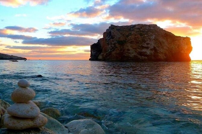 Half Day Malta Tour to Gozo Comino and Blue Lagoon Caves - A small boat makes Comino easier to enjoy