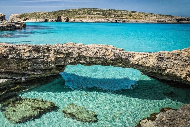 Half Day Malta Tour to Gozo Comino and Blue Lagoon Caves - Crystal Lagoon: the strongest swimming stop