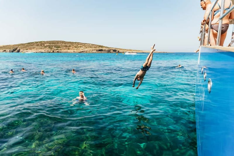 Malta: Blue Lagoon, Beaches & Bays Trip by Catamaran - Crystal Lagoon, caves, and the optional barbecue