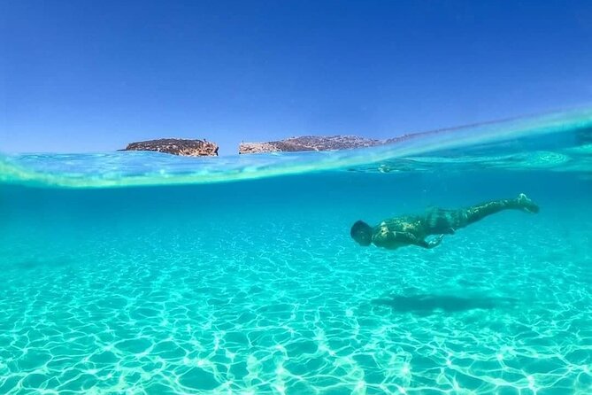 Malta: Comino, Blue Lagoon & Caves - swim, snorkel & slide - A full day from Bugibba to Comino