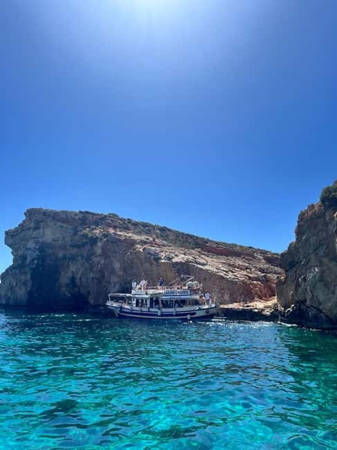 Malta: Comino, Gozo, Blue & Crystal Lagoon, and Caves Cruise - Crystal Lagoon: cliffs, clear water, and a quieter stop