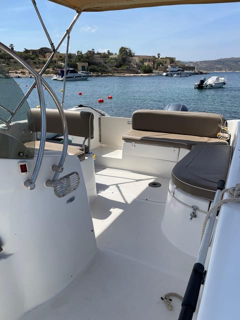 Malta:Gozo,Comino,Crystal/BlueLagoon&Caves Private Boat trip - Comino’s caves, arches, and cliff walls