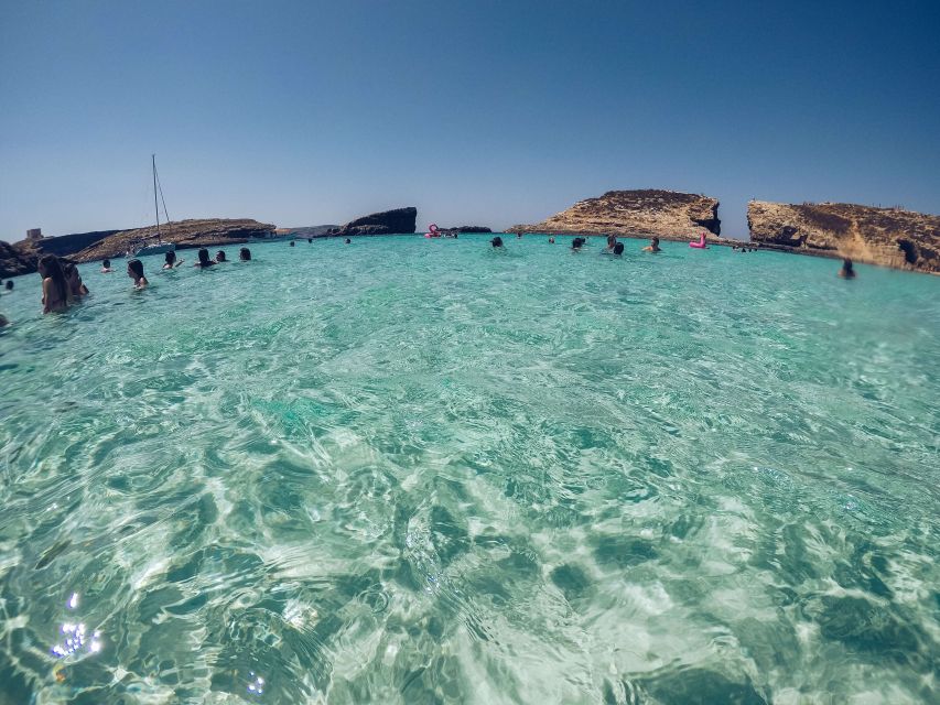 Malta: Private Boat Charter to Blue-Lagoon, Gozo & Comino - Comino’s caves, arches, and swimming spots