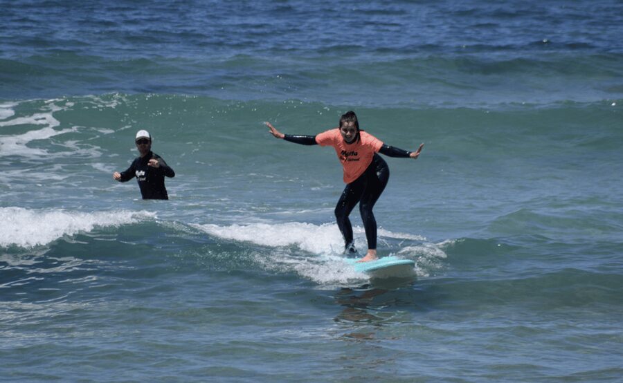 Malta Surf School, Beginner Surf Lessons - Starting Beside the Blue Flag at Singita Kiosk