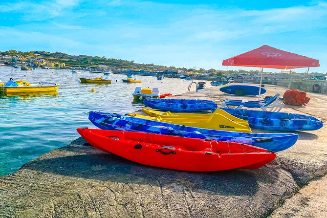 Malta: Ultimate Kayak Adventure - Looking for sea caves along the coast