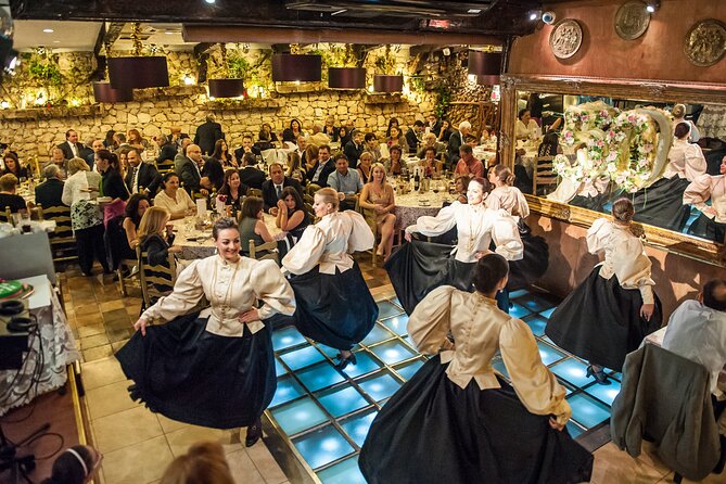 Maltese Traditional Dinner and Folklore Show with Transfers - The host and restaurant atmosphere