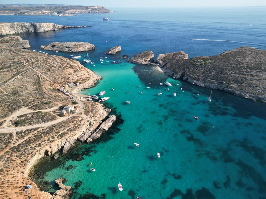 Mellieha: Comino, Crystal & Blue Lagoon 2 Bay Evening Cruise - Comino on foot and views toward Cominotto