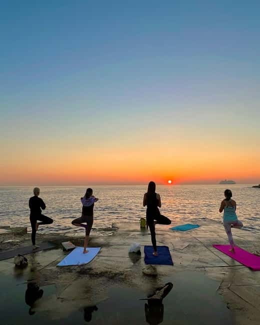 Sliema: Beach Yoga Class with Swimming - How the sunrise and sunset choices change the experience