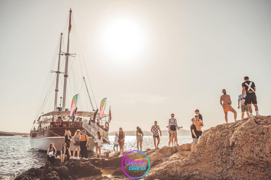 Sliema: Sailboat Party with an Open Bar, Food, and Swimming - Sunset views toward Valletta