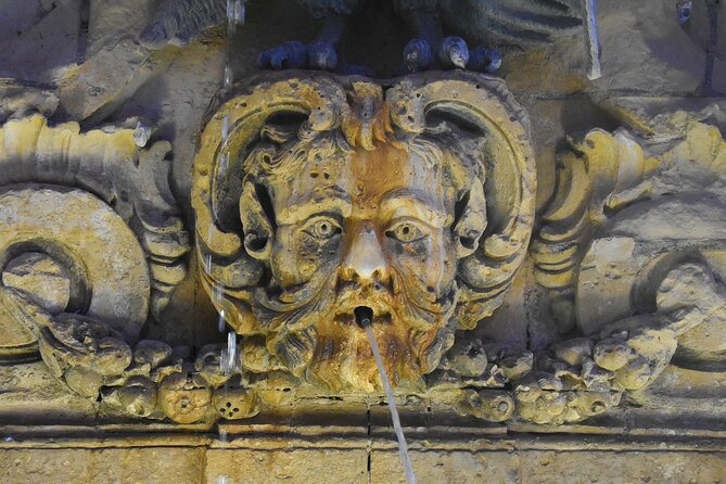 The Grand Tour of Valletta - Starting at Triton Fountain and entering Valletta